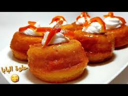 حلوة البابا بذوق البرتقال خفة بنة و انتعاش أسرع و أسهل وصفة و ناجحة Les Babas Youtube Au Jus Food Jus