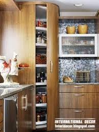High Cupboards Reach The Ceiling To Maximize Space Kitchen Storage Solutions Kitchen Pantry Design Pantry Design Kitchen Storage Solutions