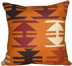 The perfect solo statement on a modern chair or bed, the rectangular lines of the lumbar pillow are effortlessly chic. Tribal Orange 22x22 Decorative Pillow From Pillow Decor