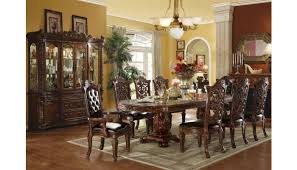 A traditional dining room table is an absolute necessity for homes with sophisticated and stately décor aspirations. Vendome Traditional Dining Table Set