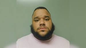 Man faces charges accused of threatening to burn down home with woman,  children inside