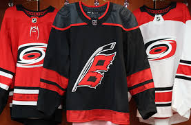 The official carolina hurricanes team colors are red, white, silver and black. Carolina Hurricanes Unveil New Black Third Uniform Sportslogos Net News