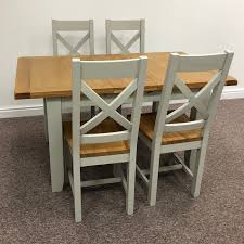 The standard table slide, used for opening and extending standard four leg tables, consists of a series of parallel boards that are able to slide back and forth on smooth joinery with a male and female butterfly notch. Dover Oak Grey Extending Dining Table 120 4 Chairs Moon Furniture