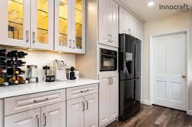 I chose a pale taupe color for the lower cabinets and the kitchen island, and a soft white for the upper cabinets and pantry. Ash Taupe Rta Cabinets Cabinet City Kitchen And Bath