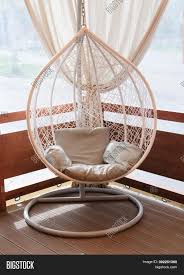Handmade rattan furniture indoor swing chair and outdoor swing chair. Wicker Rattan Hanging Image Photo Free Trial Bigstock