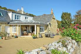 The cottages have been created using reclaimed wood which has been hand painted and each has a driftwood roof. Holiday Oceanblue Coastal Retreats