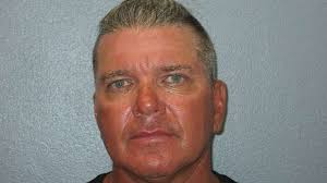 Keys man hurls knife at woman, lodging it in her foot, deputies say