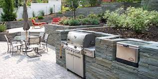 This next photo of the outdoor kitchen showing the space opposite the grill again features the aztec xlx stacked stone panels used to create the waist wall defining the outdoor kitchen from the rest of the yard. Stone Veneer For Outdoor Kitchens Landscaping Network