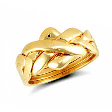 Puzzle piece keychain for couples we're like puzzle pieces that fit together matching. 9ct Yellow Gold 4 Piece Puzzle Ring Jewellery From Hillier Jewellers Uk