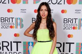 The series star, 18, beamed as she cuddled up to the producer, 24, before leaning in for a romantic kiss while taking in the sunset. Olivia Rodrigo Is Dating Film Producer Adam Faze