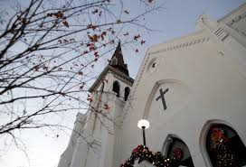 White ribbons commemorating shooting victims are placed on a railing outside emanuel ame church in charleston, south carolina on june 18, 2015. Lawsuit By Family Of Victims Of South Carolina Church Shooting Reinstated To Look At Faulty Background Checks Pbs Newshour