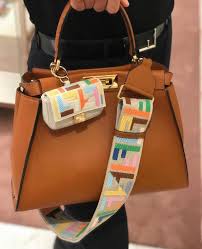 Enoch loves to peek out of her vines! An Extensive Guide To The Fendi Peekaboo Bag Pursebop
