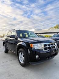 Image result for Tuxedo Black 2012 Escape