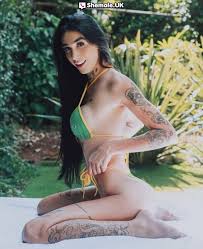 Brazilian porn actress, tattooed and skinny, versatile and local. from  Cardiff - Shemale.UK