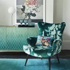 Elegant Reading Corner With Floral Armchair And Artwork Living Room Design Diy Living Room Diy Living Room Pictures