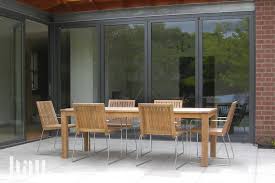Consider different styles of modern outdoor dining chairs when outfitting your space for garden parties, barbecues and beyond. Tripoli Contemporary Teak Garden Chairs Bau Outdoors
