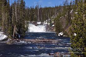 This 30 foot waterfall is located along the south entrance road just south of lewis lake. Lewis Falls Yellowstone National Park Photograph By Rodney Cammauf