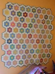 How to hand quilt grandmother's flower garden. Grandmothers Flower Garden Quilt Patterns Quilting Quest Grandmothers Flower Garden Quilt Flower Garden Quilt Grandmothers Flower Garden