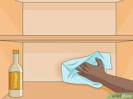 Remove the cabinet doors and drawers and remove all pulls, knobs, latches and other hardware if the old paint is flaking off in places, the original finish did not adhere well to the wood surface. How To Line Kitchen Shelves 11 Steps With Pictures Wikihow