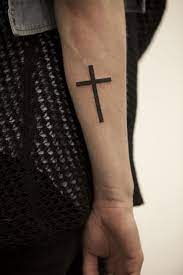 Does a christian cross tattoo have cross tattoos meaning: Pin Em Long Thin Tattoos