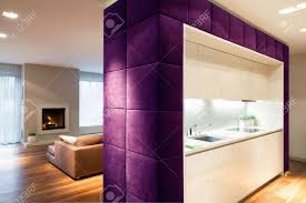 This will keep the buzz in the kitchen away, without encroaching on the dining or living space. Living Room And Kitchen Separated By Partition Stock Photo Picture And Royalty Free Image Image 42424218