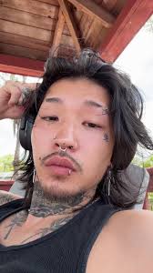 Jae and Tattoo Artist