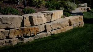 Downstairs, the ambiance is warm and relaxed, complete with a fireplace. Dry Stacked Stone Walls The Field