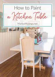 Here, a chunky wooden dining table has had its legs painted a rich, inky colour, while the top is zinc. How To Paint A Kitchen Table Farmhouse Diy Marty S Musings