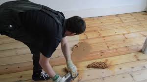 Gap Filling Wooden Pine Floor With Filler And Sawdust Mix Pine Floors Old Wood Floors Sanding Floorboards