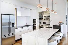 This Sleek Kitchen Has A Stylish Scullery At The End And It Can Be Hidden Away By Sliding Doors Sleek Kitchen Pantry Layout Kitchen Butlers Pantry