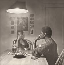 Carrie mae weems, untitled (woman feeding bird), the kitchen table series, 1990, gelatin silver print (printed 2015), 27.94 x 27.94 cm © carrie mae weems (crystal bridges museum of american art) speakers: Kitchen Table Series