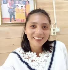 Delina Laoli Ina Hokky added a...