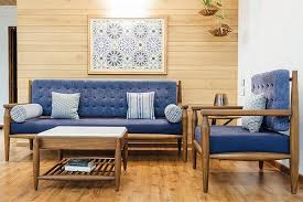 Our media consoles, bookcases, coffee table chests, and living room sets are built with indian rosewood, teak, mango wood, acacia and other superior hardwoods. The Teak Wood Furniture In This Home Combines Traditional Purpose Modern Lifestyle Dress Your Home Furniture Design Living Room Sofas Wooden Sofa Designs Sofa Design Wood