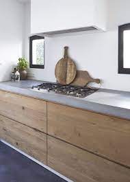 kitchen by molitli country minimalist with grey counters wood cabinets black frame windows modern kitchen design minimalist kitchen concrete kitchen