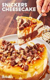 if you love snickers you need this chocolate marble cheesecake in your life recipe snickers cheesecake recipes gourmet recipes