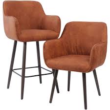 Easy to clean with food or drink spillages, this type of dining chair suits the family tea time and lavish dinner parties. Tan Leather Look Retro Dining Chair With Arms The Libra Company