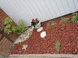 Vigoro 0 5 Cu Ft Bagged Decorative Stone Red Lava Rock 440897 The Home Depot Stone Landscaping Landscaping With Rocks Fall Landscaping