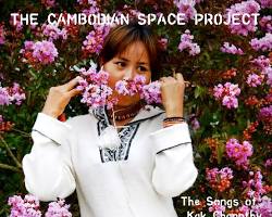 Hands-on scrapbooking workshop in Cambodia with various craft materials.