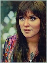 Melanie......"lay down, lay down. lay it all down. let your white birds  smile up at the ones who stand & frown"