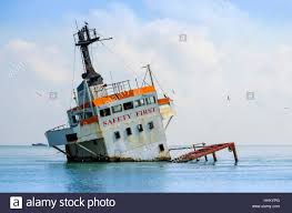 shipwreck, sinking cargo ship in the