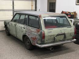 Image result for Gray 1971 Datsun