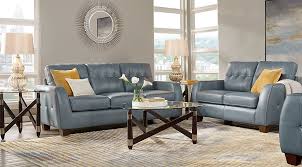 To keep the yellow from overtaking the room, introduce cooler tones, such as blue or purple, for contrast and balance. Blue White Yellow Living Room Furniture Decorating Ideas