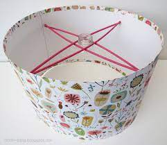 If you have some unemployed coat hangers lying around, it's time to use them to carry out all your diy. Ohoh Blog Inspirational From Cardboard Thin Wooden Sticks Tied Together At The Ends And Two Thumbtacks Plus The Diy Lamp Shade Make A Lampshade Diy Lamp