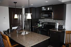 Condo Kitchen Designs For Modern Contemporary Grey Marble Brown Wooden Kitchen Co Modern Kitchen Design Kitchen Design Modern Contemporary New Kitchen Designs