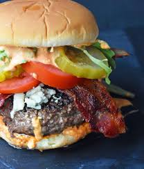 The Dragonslayer Burger Made With Seasoned Beef Blue Cheese Smoky Bacon Juicy Tomatoes Blue Cheese Burger Sauce Cookout Food Blue Cheese Burgers Recipes