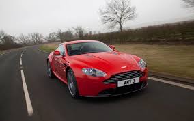 Image result for Magma Red 2012 Aston Martin