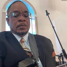 Why do people tune their basses down a half step or more?