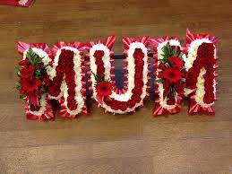 When choosing a floral arrangement, pick her favorite flower or color and fashion a wreath, basket or standing spray. Funeral Flowers