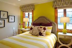 Rosy colors repeat in the area rug, bedding, table lamp, and pillows. Yellow And Purple Bedroom Houzz
