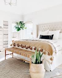It maximizes the space in the room while lending a classic touch to the room. Neutral Color Scheme Boho Bedroom Design Cream Tufted Headboard Woven Bench Home Decor Bedroom Interior Home Decor Bedroom